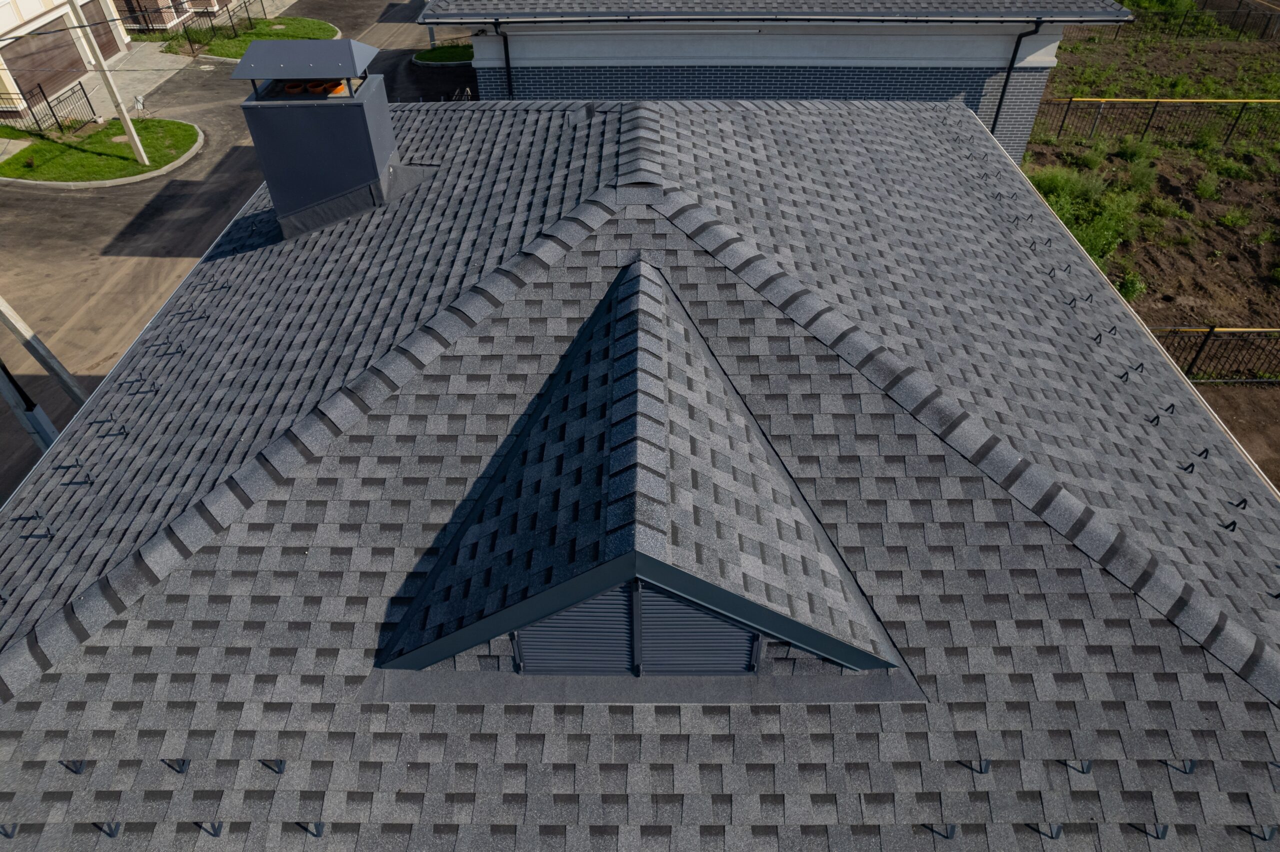 Aerial close-up of a finished architectural asphalt shingle roof installed by Stonegate in Jessamine County